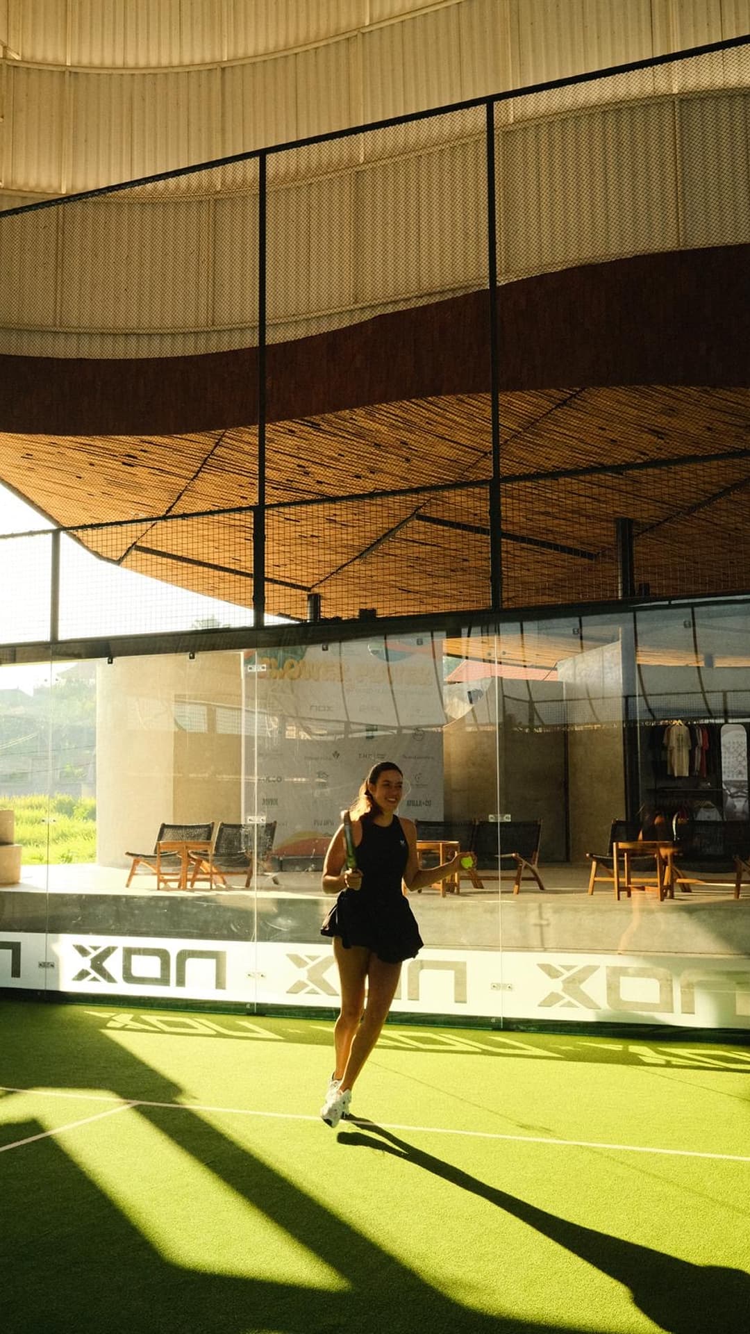 Sarah playing paddle tennis